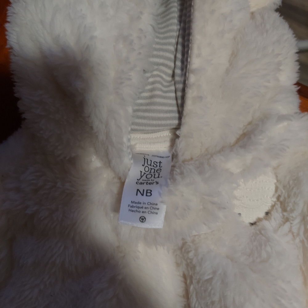 Like new warm fleece footed pj with hood newborn